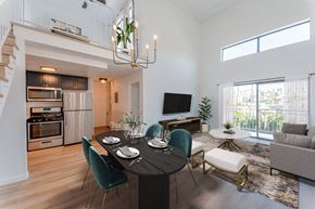 Los Angeles apartment for rent - A modern dining room with a round table set for four.