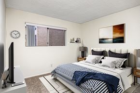 Redondo Beach apartment for rent - A bedroom with a bed, nightstand, and television.