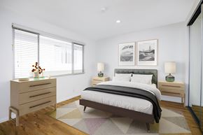 Beverly Hills apartment for rent - a bedroom with a bed and two windows