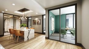 Las Vegas apartment for rent - A modern dining room with a wooden table and chairs.
