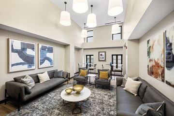 Philadelphia apartment for rent - a living room with couches and chairs and a table