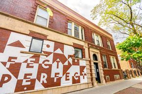 Chicago apartment for rent - A building with a mural that reads "Fech Perfeck".