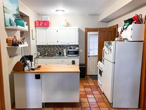 Chicago apartment for rent - A kitchen with a refrigerator, oven, and sink.