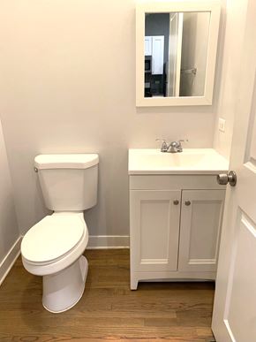 Chicago apartment for rent - a small bathroom with a toilet and a sink