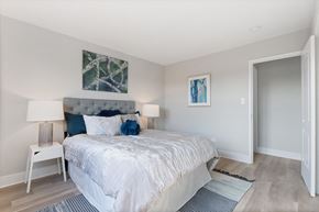 Chicago apartment for rent - a bedroom with a bed and a door to a bathroom