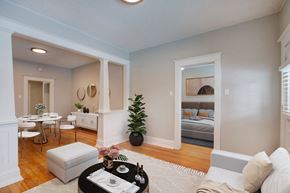 Denver apartment for rent - a living room with a couch and a table