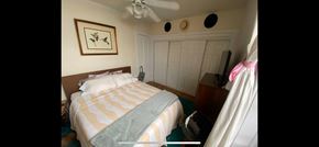 Chicago apartment for rent - A bedroom with a bed, a dresser and a painting on the wall.