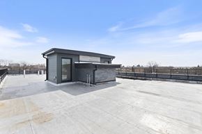 Chicago apartment for rent - the roof deck has a small cabin with a hot tub on it