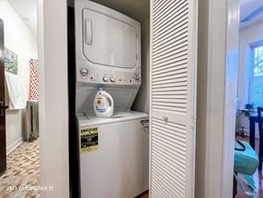 Chicago apartment for rent - A white Whipple unit is in a narrow space between two walls.