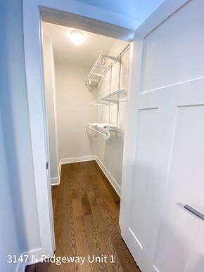 Chicago apartment for rent - A white door with a handle is on the right side of the image.