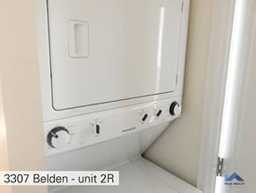 Chicago apartment for rent - two washers and a dryer in a white room