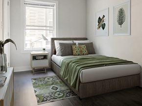 Chicago apartment for rent - a bedroom with a bed and a window