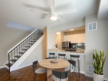 Chicago apartment for rent - A modern kitchen with a dining table and chairs.