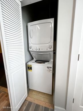 Chicago apartment for rent - A white dryer and washer are installed in a small closet.