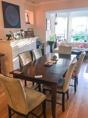 Evanston apartment for rent - A dining room with a wooden table and chairs.