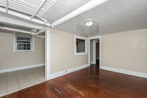 Denver apartment for rent - A room with a window and a door.