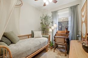 Evanston apartment for rent - A bedroom with a bed, desk, and chair.