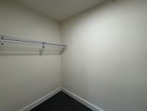 Chicago apartment for rent - A white wall with a metal rack on it.