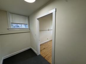 Chicago apartment for rent - A room with a doorway leading to another room.