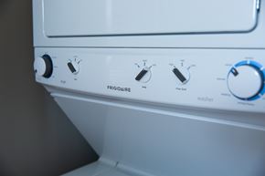 Chicago apartment for rent - A white washing machine with the control panel showing.