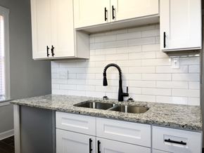 Chicago apartment for rent - A kitchen with a sink and a counter.