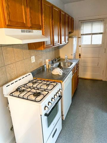 Chicago apartment for rent - a kitchen with a stove and a sink