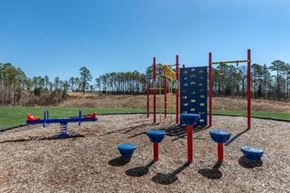 Oxford apartment for rent - a playground with a swing set and other playground equipment