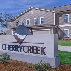 Pontotoc apartment for rent - a sign for cherry creek in front of a house