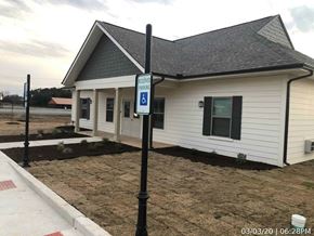 Bangs apartment for rent - a white house with a handicapped sign in front of it