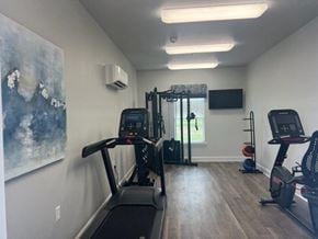 Sterlington apartment for rent - A gym with treadmills and exercise equipment.