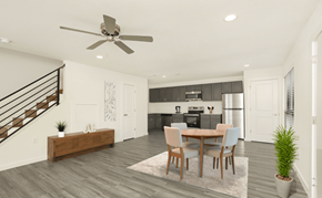 Houma townhouse for rent - A modern dining room with a wooden table and chairs.