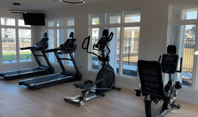 Shreveport apartment for rent - A home gym with treadmills, stationary bikes, and elliptical machines.