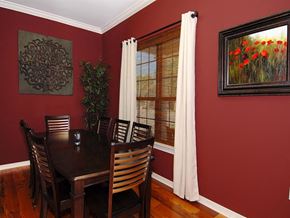Covington apartment for rent - a dining room with a wooden table and chairs