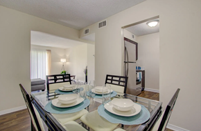 Jackson apartment for rent - A dining room with a glass table and chairs.