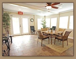 Slidell apartment for rent - A dining room with a table and chairs.