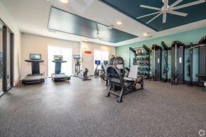 Baton Rouge apartment for rent - a gym with weights and cardio equipment at the apartments