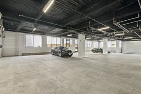 Philadelphia apartment for rent - A spacious garage with two cars parked inside.