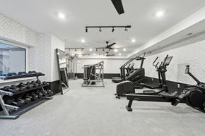 Philadelphia apartment for rent - A spacious gym with a variety of equipment at The Isaac Apartments, Philadelphia, PA 19122