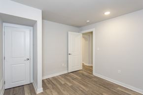 Conshohocken apartment for rent - a bedroom with hardwood floors and white walls