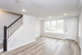 Conshohocken apartment for rent - a living room with hardwood floors and white walls