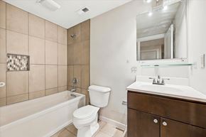 Philadelphia apartment for rent - A bathroom with a toilet, sink, and bathtub.