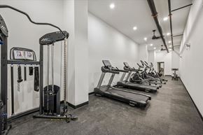 Philadelphia apartment for rent - A gym with treadmills, elliptical machines, and other exercise equipment.