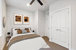 Philadelphia apartment for rent - a bedroom with a bed and a ceiling fan