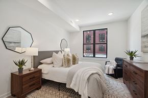 Philadelphia apartment for rent - a bedroom with a large bed at The Anchorage on Kelly, Philadelphia, PA 19129