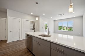Philadelphia apartment for rent - an empty kitchen with a sink and a window