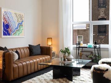 Philadelphia apartment for rent - a living room with a couch and a coffee table