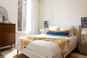 Philadelphia apartment for rent - a bedroom with a bed and a dresser