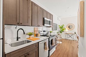 Philadelphia apartment for rent - a kitchen with a sink and a stove and a microwave
