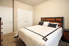 Watford City apartment for rent - a bedroom with a bed and a closet