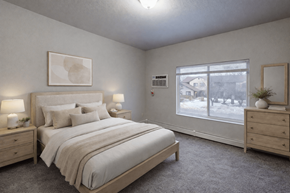 Fargo apartment for rent - A bedroom with a large bed, two nightstands, and a window showing a snowy view outside.